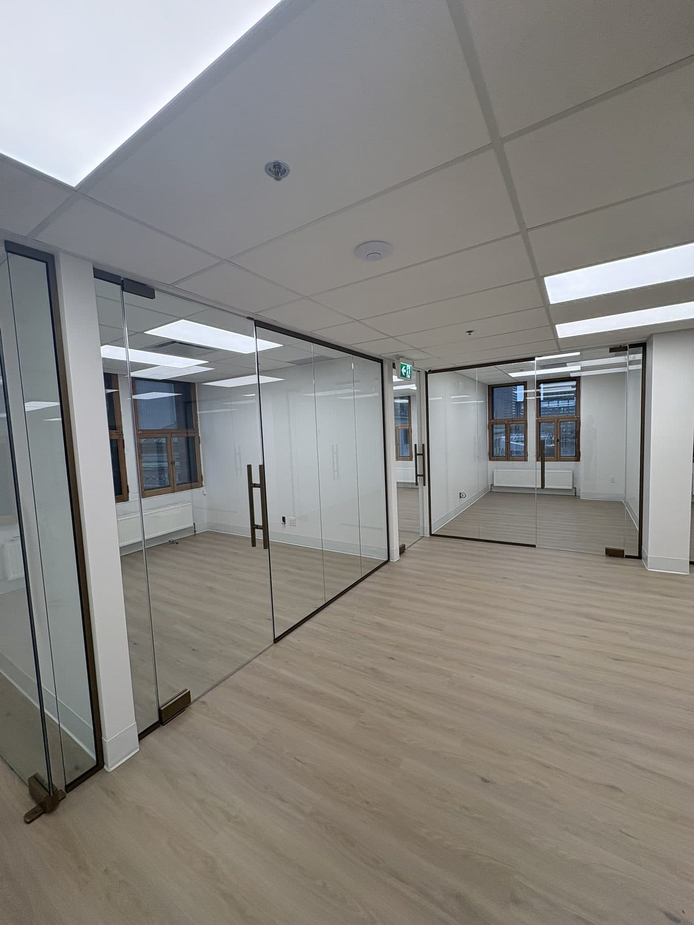 Office corridor with glass doors