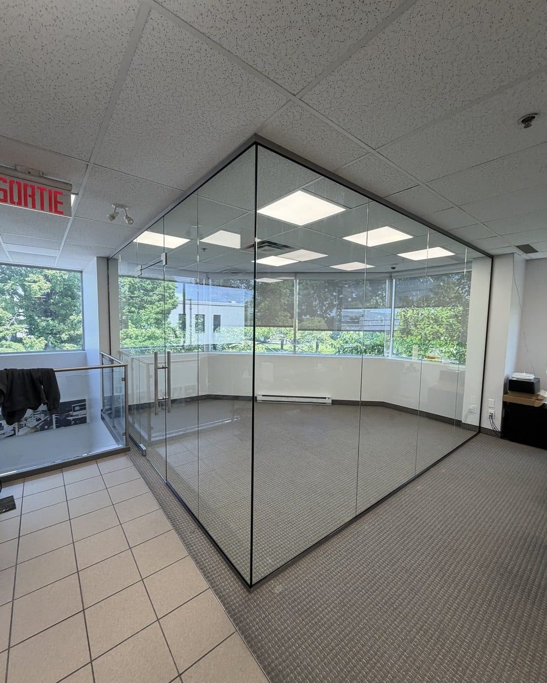 Frameless glass office corner