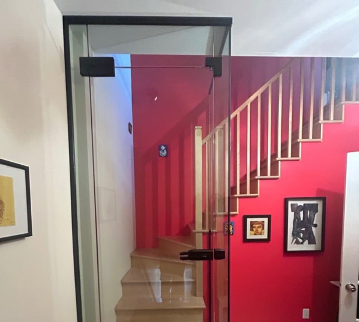 Glass panel along a staircase