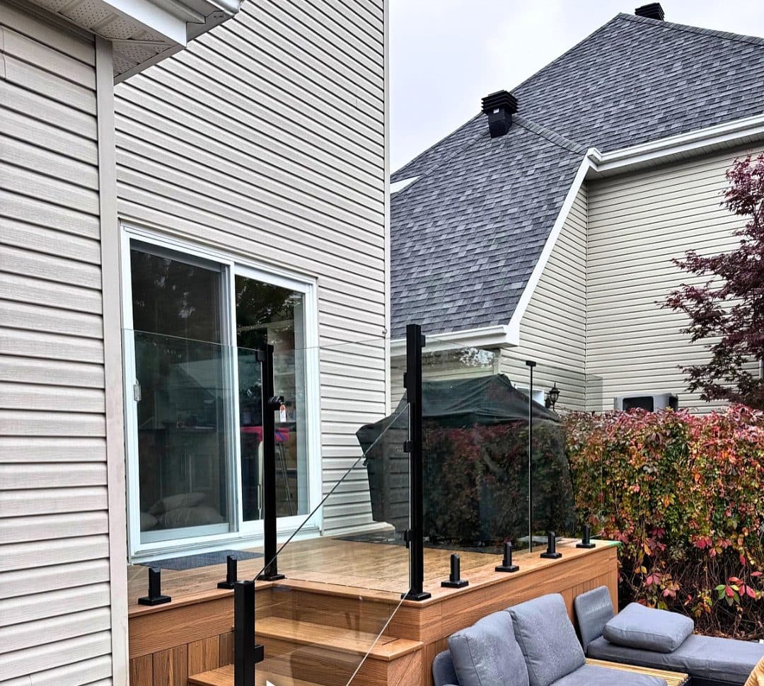 Glass railing on a wooden deck