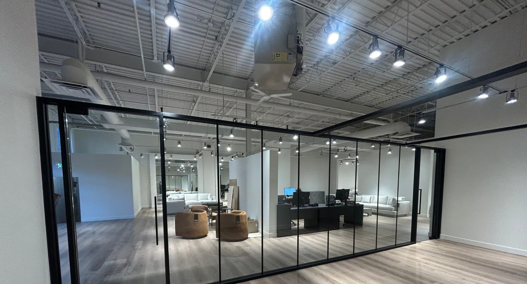 Glass meeting room in an open office