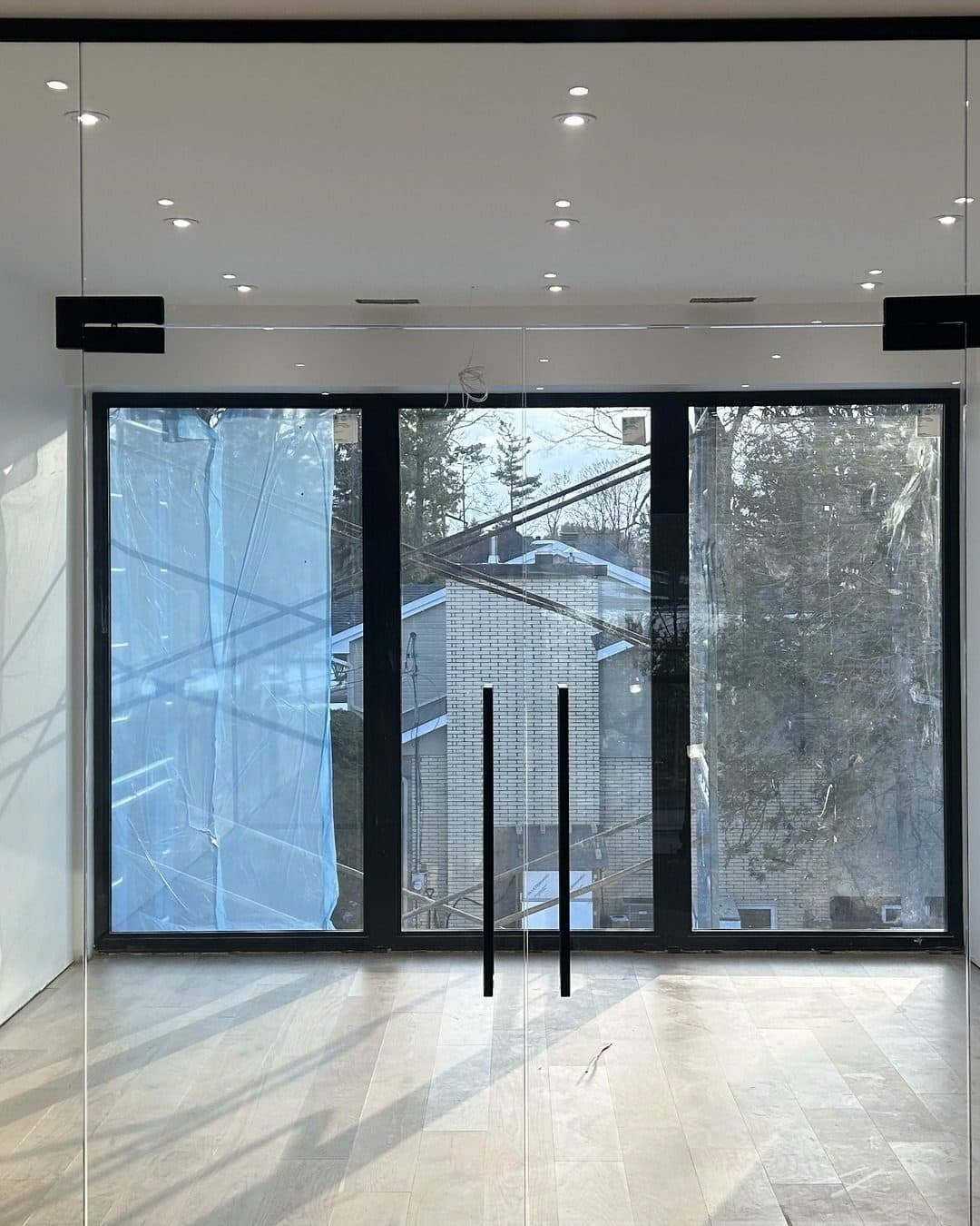 Black-frame double glass doors for a home office