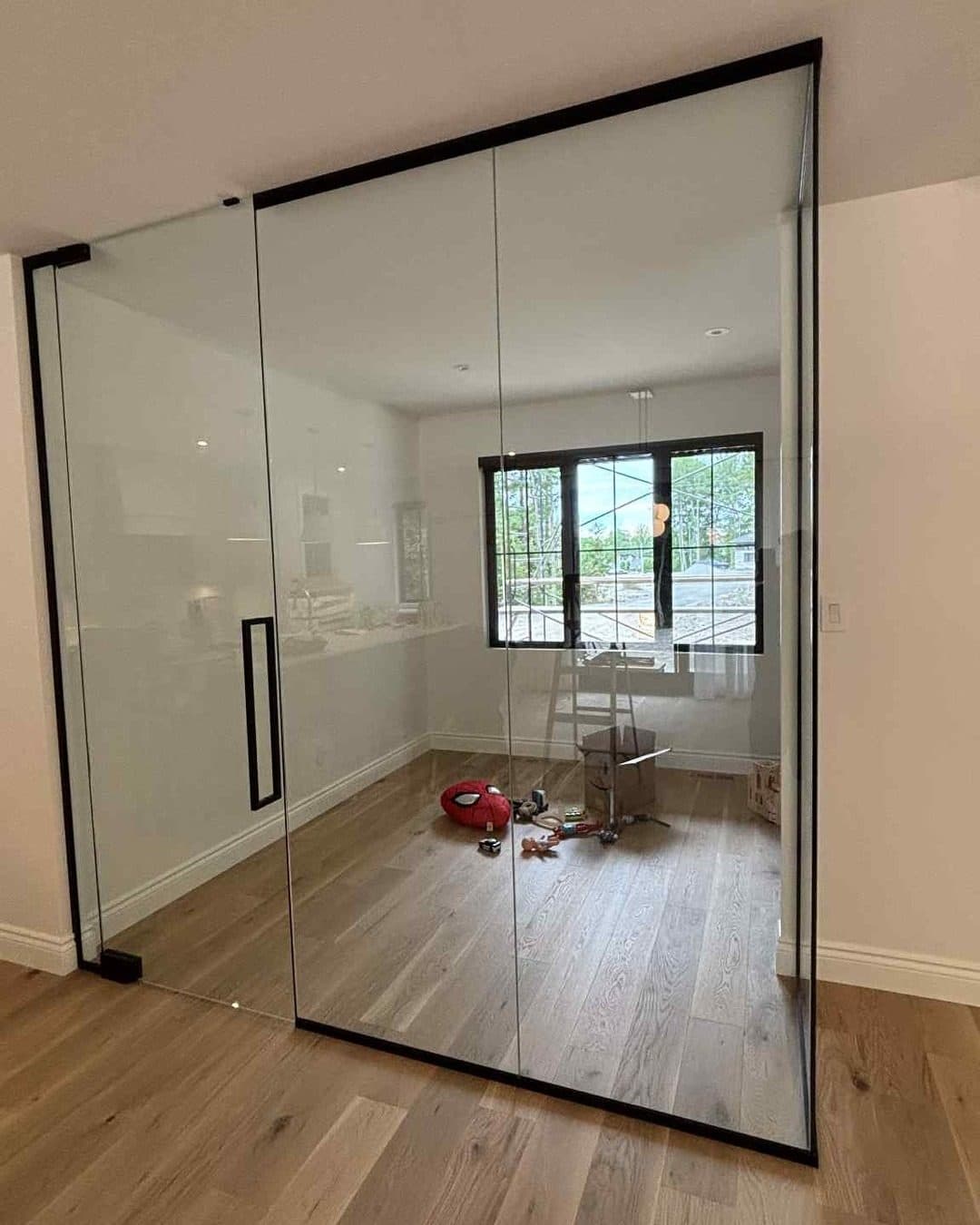 Glass wall with door for a bedroom