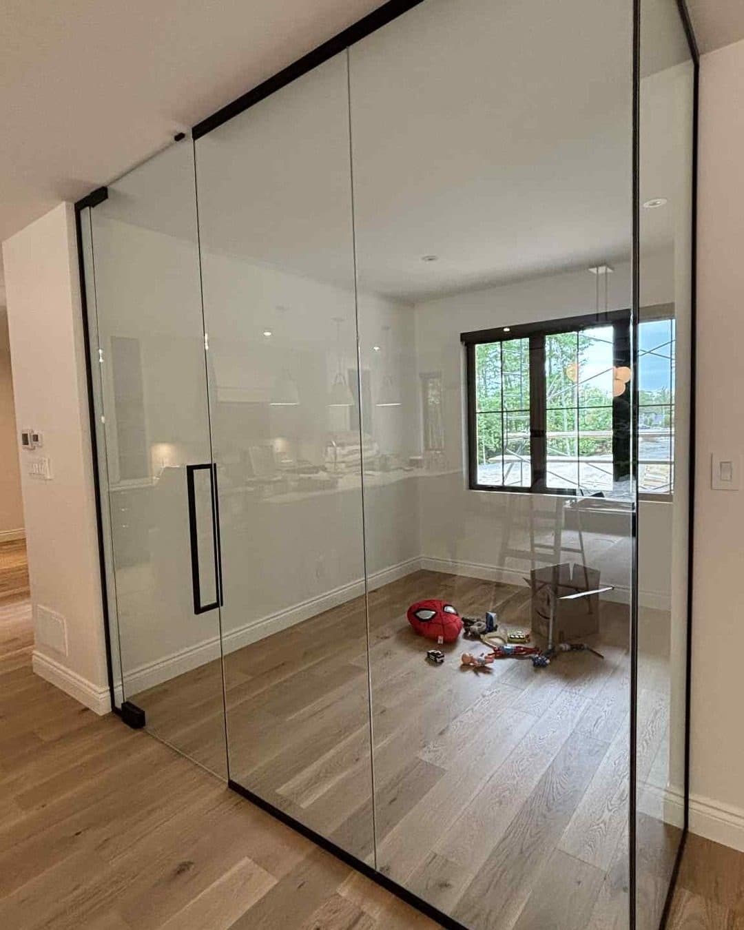 Glass wall closing a playroom